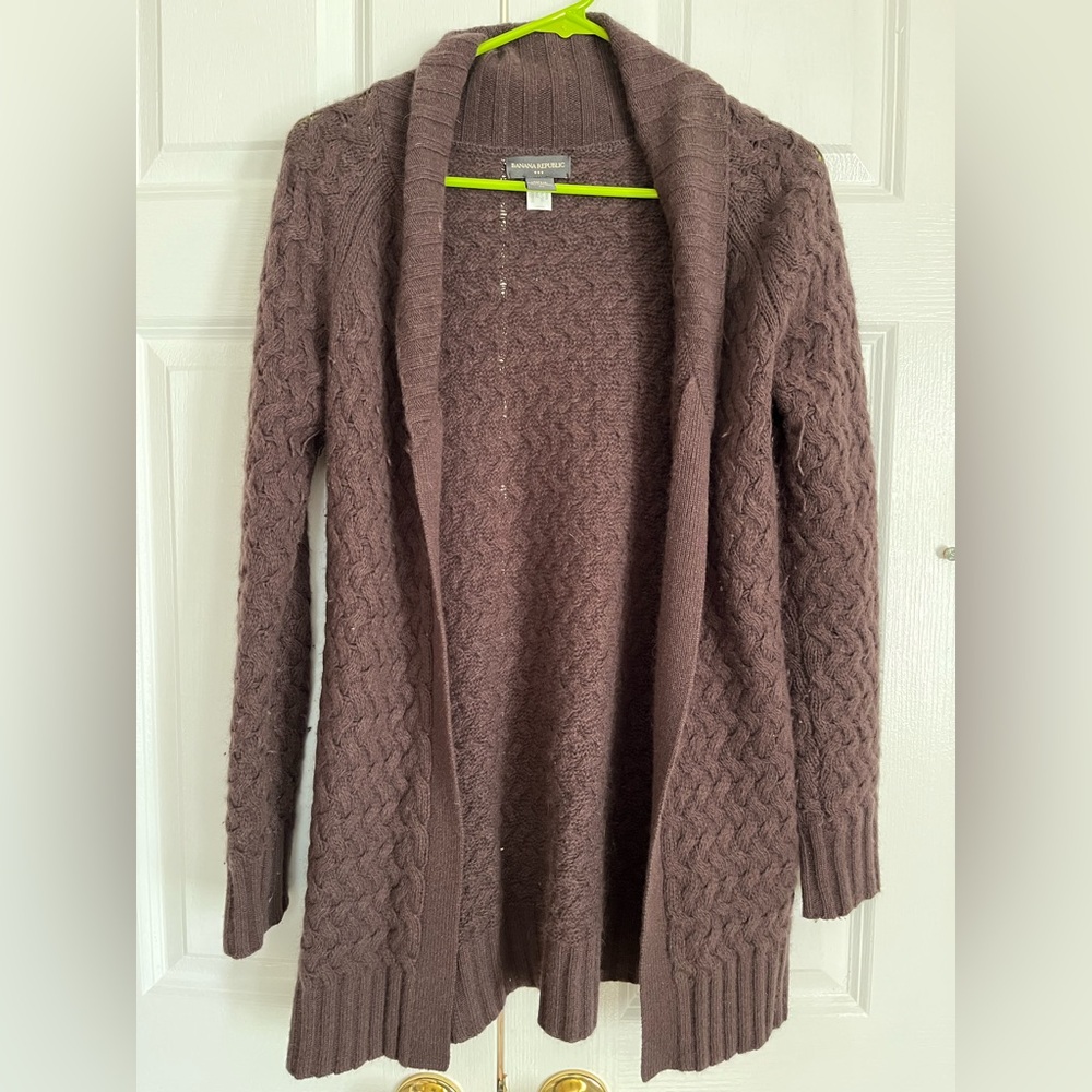 Banana Republic long sweater has some wear.